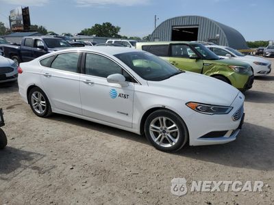 Czwarte zdjęcie samochodu z boku: 2018 FORD FUSION SE HYBRID VIN:3FA6P0LU3JR129863 - miniatura