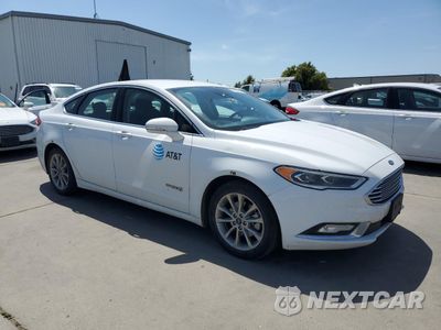 Czwarte zdjęcie samochodu z boku: 2017 FORD FUSION SE HYBRID VIN:3FA6P0LU0HR408892 - miniatura