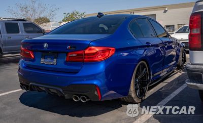Zdjęcie 6 z 10 samochodu: 2019 BMW M5 VIN:WBSJF0C54KB448350 - miniatura