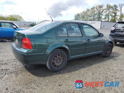 Trzecie zdjęcie samochodu z tyłu: 1999 VOLKSWAGEN JETTA GL VIN:3VWRA29M3XM106405 - miniatura