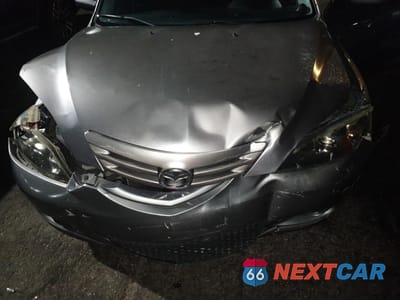 Zdjęcie 11 z 12 samochodu: 2005 MAZDA 3 HATCHBACK VIN:JM1BK143951276677 - miniatura