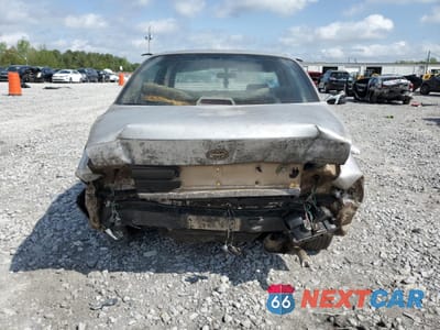 Zdjęcie 6 z 14 samochodu: 1997 TOYOTA COROLLA DX VIN:1NXBA02EXVZ538005 - miniatura