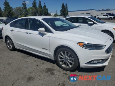 Czwarte zdjęcie samochodu z boku: 2017 FORD FUSION SE HYBRID VIN:3FA6P0LU5HR409312 - miniatura