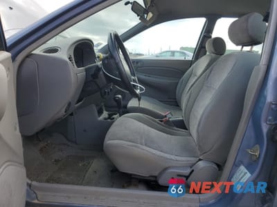 Zdjęcie 7 z 14 samochodu: 1999 FORD ESCORT SE VIN:1FAFP13P6XW123738 - miniatura