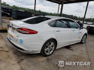 Trzecie zdjęcie samochodu z tyłu: 2018 FORD FUSION SE HYBRID VIN:3FA6P0LU2JR118627 - miniatura
