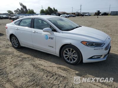 Czwarte zdjęcie samochodu z boku: 2017 FORD FUSION SE HYBRID VIN:3FA6P0LU5HR409200 - miniatura