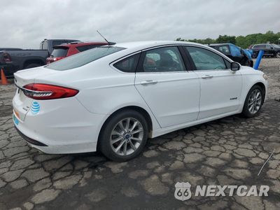Trzecie zdjęcie samochodu z tyłu: 2017 FORD FUSION SE HYBRID VIN:3FA6P0LU4HR359664 - miniatura