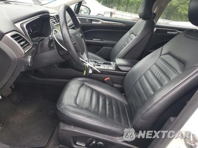 Zdjęcie 7 z 12 samochodu: 2017 FORD FUSION SE HYBRID VIN:3FA6P0LU0HR409640 - miniatura
