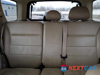 Zdjęcie 10 z 13 samochodu: 2007 FORD ESCAPE LIMITED VIN:1FMCU94187KC03057 - miniatura