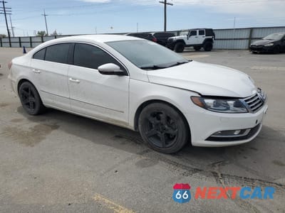 Czwarte zdjęcie samochodu z boku: 2014 VOLKSWAGEN CC SPORT VIN:WVWBP7AN5EE523435 - miniatura