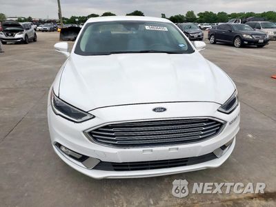 Piąte zdjęcie samochodu w środku: 2017 FORD FUSION SE HYBRID VIN:3FA6P0LU9HR408986 - miniatura