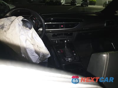 Zdjęcie 8 z 12 samochodu: 2014 AUDI RS7 VIN:WUAW2AFC5EN900997 - miniatura