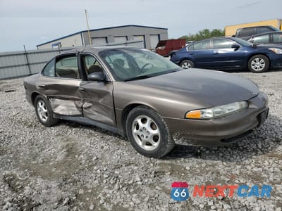 Czwarte zdjęcie samochodu z boku: 1999 OLDSMOBILE INTRIGUE GX VIN:1G3WH52H7XF347531 - miniatura