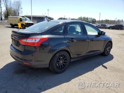 Trzecie zdjęcie samochodu z tyłu: 2014 FORD FOCUS SE VIN:1FADP3F29EL297594 - miniatura
