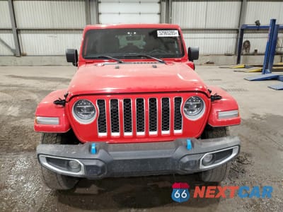 Piąte zdjęcie samochodu w środku: 2022 JEEP WRANGLER UNLIMITED SAHARA 4XE VIN:1C4JJXP69NW119609 - miniatura