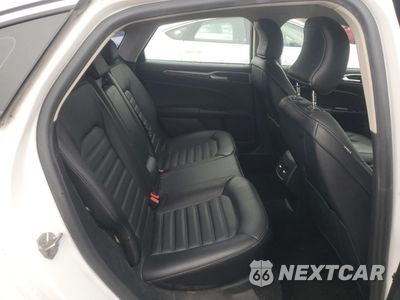 Zdjęcie 10 z 13 samochodu: 2018 FORD FUSION SE HYBRID VIN:3FA6P0LU6JR118680 - miniatura