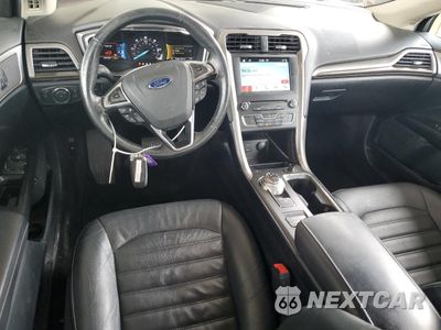 Zdjęcie 8 z 13 samochodu: 2017 FORD FUSION SE HYBRID VIN:3FA6P0LUXHR409483 - miniatura