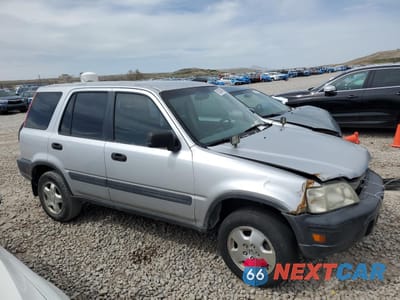Czwarte zdjęcie samochodu z boku: 1997 HONDA CR-V LX VIN:JHLRD1856VC043722 - miniatura
