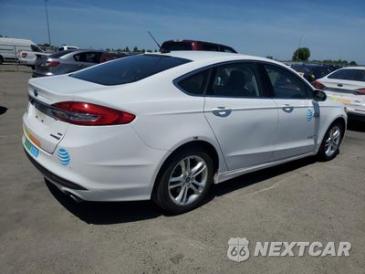 Trzecie zdjęcie samochodu z tyłu: 2018 FORD FUSION SE HYBRID VIN:3FA6P0LU0JR171536 - miniatura