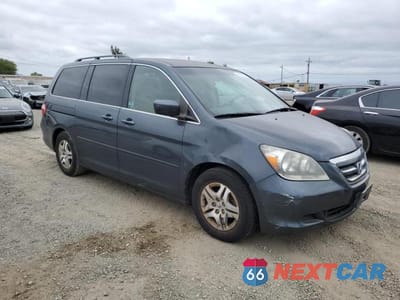 Czwarte zdjęcie samochodu z boku: 2005 HONDA ODYSSEY EX VIN:5FNRL38415B023674 - miniatura