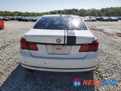 Zdjęcie 6 z 13 samochodu: 2014 BMW 740 I VIN:WBAYA6C58ED144242 - miniatura