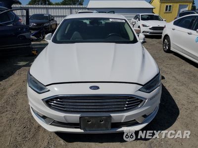 Piąte zdjęcie samochodu w środku: 2017 FORD FUSION SE HYBRID VIN:3FA6P0LU4HR409155 - miniatura