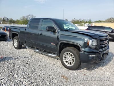 Czwarte zdjęcie samochodu z boku: 2018 GMC SIERRA K1500 SLT VIN:3GTU2NEC3JG136096 - miniatura