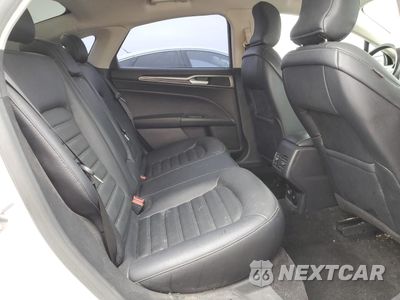 Zdjęcie 10 z 13 samochodu: 2017 FORD FUSION SE HYBRID VIN:3FA6P0LUXHR409709 - miniatura