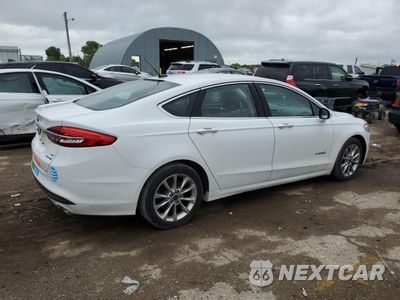Trzecie zdjęcie samochodu z tyłu: 2017 FORD FUSION SE HYBRID VIN:3FA6P0LU7HR409098 - miniatura