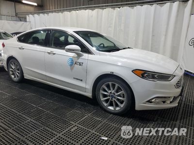 Czwarte zdjęcie samochodu z boku: 2017 FORD FUSION SE HYBRID VIN:3FA6P0LUXHR409628 - miniatura