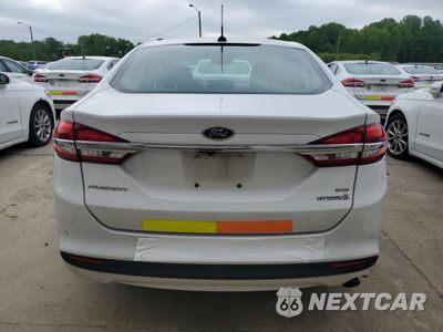 Zdjęcie 6 z 12 samochodu: 2017 FORD FUSION SE HYBRID VIN:3FA6P0LU1HR409663 - miniatura