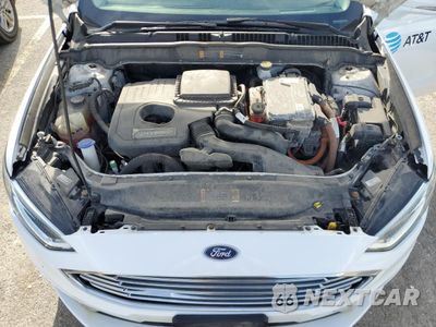 Zdjęcie 11 z 13 samochodu: 2018 FORD FUSION SE HYBRID VIN:3FA6P0LU0JR118724 - miniatura