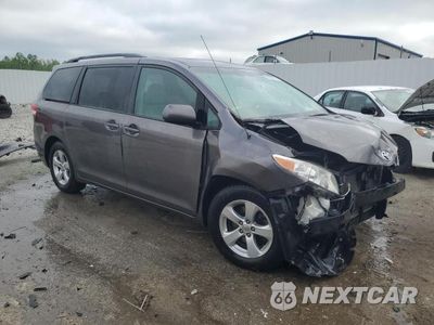 Czwarte zdjęcie samochodu z boku: 2014 TOYOTA SIENNA LE 8-PASSENGER VIN:5TDKK3DC3ES498434 - miniatura