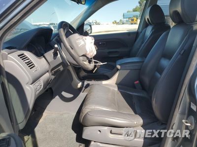 Zdjęcie 7 z 14 samochodu: 2006 HONDA PILOT EX VIN:2HKYF185X6H545822 - miniatura
