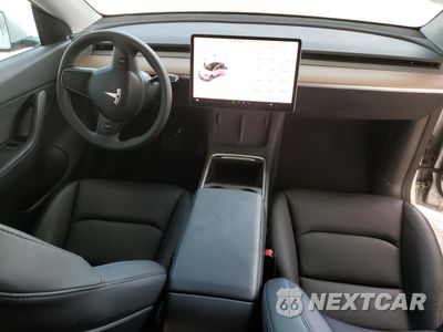 Zdjęcie 8 z 14 samochodu: 2022 TESLA MODEL Y VIN:7SAYGDEE9NF431927 - miniatura