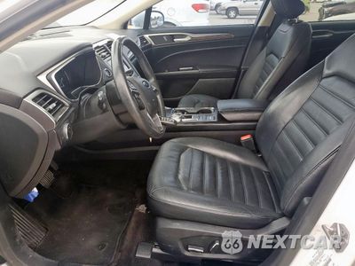 Zdjęcie 7 z 13 samochodu: 2018 FORD FUSION SE HYBRID VIN:3FA6P0LU2JR118594 - miniatura