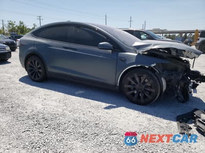 Czwarte zdjęcie samochodu z boku: 2022 TESLA MODEL X VIN:7SAXCBE62NF331544 - miniatura