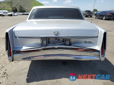 Zdjęcie 6 z 14 samochodu: 1993 CADILLAC DEVILLE VIN:1G6CD53B3P4241116 - miniatura