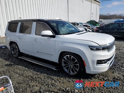 Czwarte zdjęcie samochodu z boku: 2022 JEEP GRAND WAGONEER SERIES III VIN:1C4SJVGJ5NS202569 - miniatura