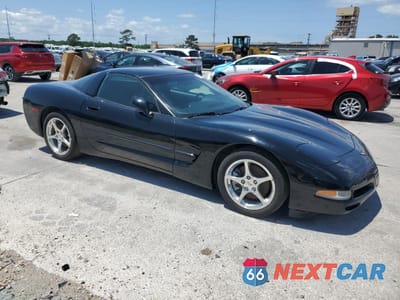 Czwarte zdjęcie samochodu z boku: 2002 CHEVROLET CORVETTE VIN:1G1YY22GX25110246 - miniatura