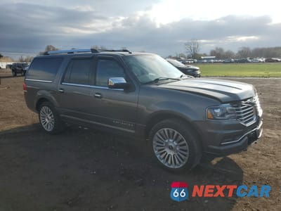 Czwarte zdjęcie samochodu z boku: 2015 LINCOLN NAVIGATOR L VIN:5LMJJ3JT4FEJ12137 - miniatura