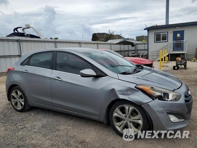 Czwarte zdjęcie samochodu z boku: 2013 HYUNDAI ELANTRA GT VIN:KMHD35LEXDU082892 - miniatura