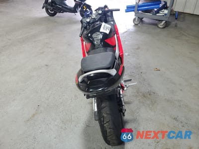 Czwarte zdjęcie samochodu z boku: 2004 HONDA CBR600 F4 VIN:JH2PC35054M502623 - miniatura