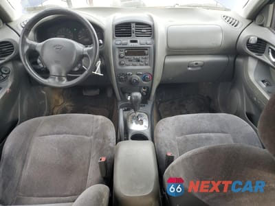 Zdjęcie 8 z 13 samochodu: 2004 HYUNDAI SANTA FE GLS VIN:KM8SC73E94U775858 - miniatura