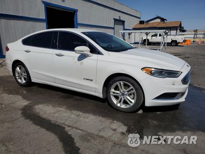 Czwarte zdjęcie samochodu z boku: 2018 FORD FUSION SE HYBRID VIN:3FA6P0LU9JR281873 - miniatura