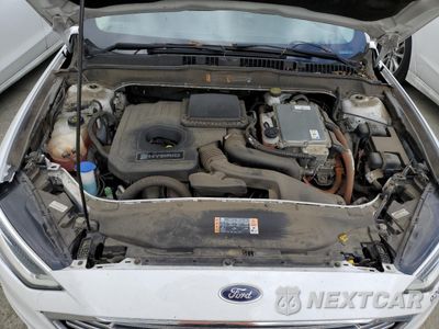 Zdjęcie 11 z 12 samochodu: 2018 FORD FUSION SE HYBRID VIN:3FA6P0LU9JR171535 - miniatura