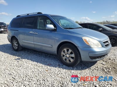 Czwarte zdjęcie samochodu z boku: 2007 HYUNDAI ENTOURAGE GLS VIN:KNDMC233676024613 - miniatura