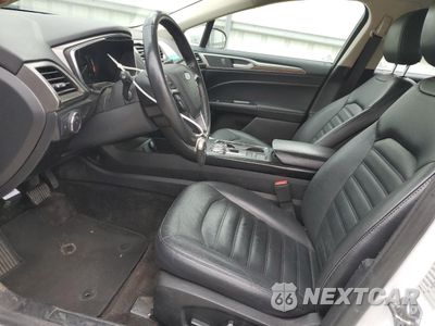 Zdjęcie 7 z 12 samochodu: 2018 FORD FUSION SE HYBRID VIN:3FA6P0LU6JR172027 - miniatura