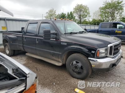 Czwarte zdjęcie samochodu z boku: 1999 FORD F350 SUPER DUTY VIN:1FTWW32F2XEA97386 - miniatura
