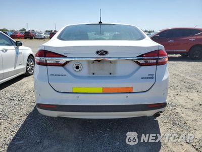 Zdjęcie 6 z 12 samochodu: 2017 FORD FUSION SE HYBRID VIN:3FA6P0LU8HR359540 - miniatura